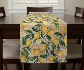 Cotton table runner with vibrant yellow lemon print on a light background, featuring a fresh citrus pattern ideal for kitchen or dining table decor, perfect for summer and farmhouse-style settings.Select 69 more words to run Humanizer.