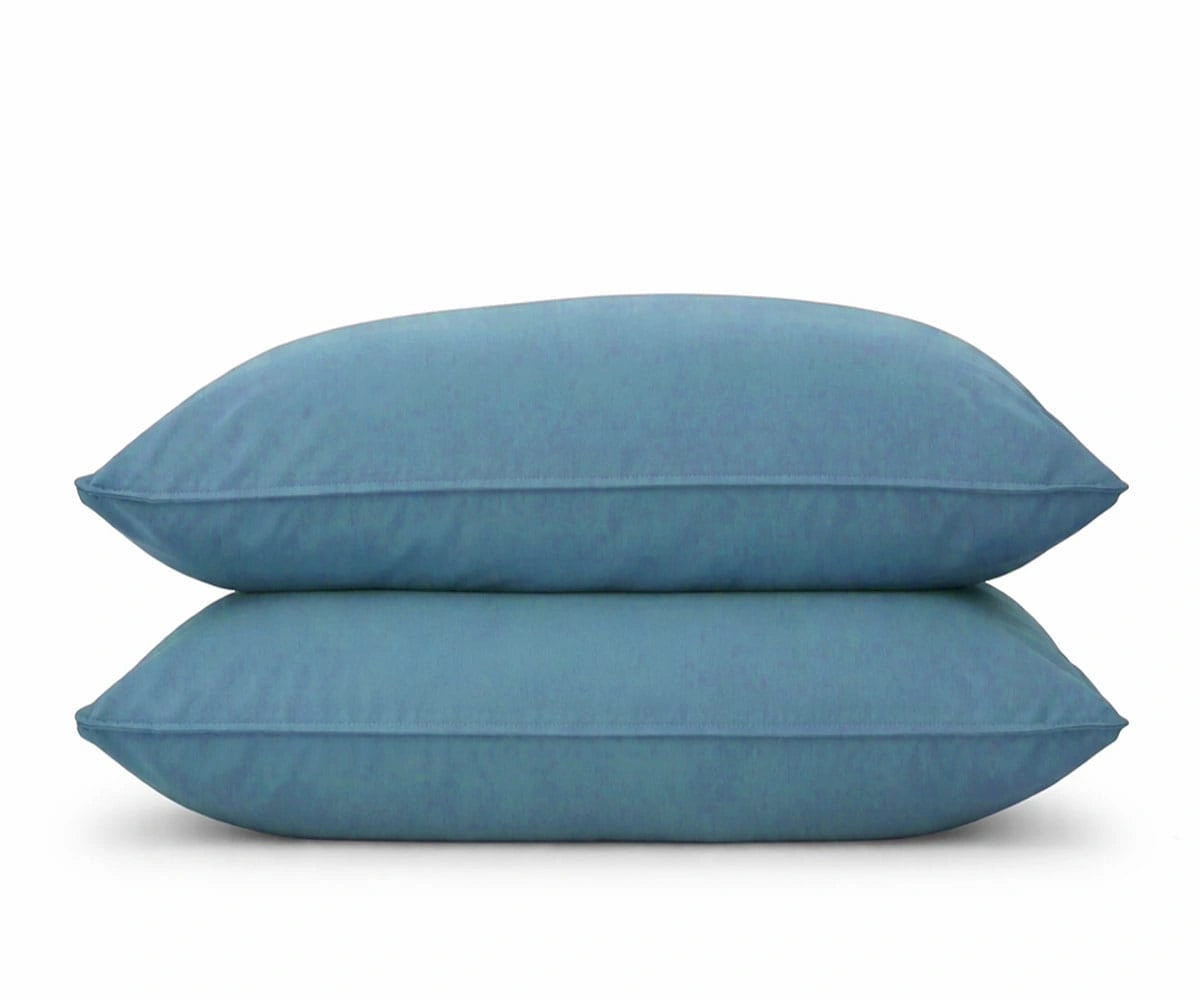 Set of 2 light blue pillowcases in a soft sky tone, premium cooling bedding essentials for a serene hotel-style bedroom and comfortable sleep.