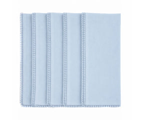 Light blue cotton pom pom napkins with knotted edge for coastal and casual table décor