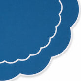 Elegant dark blue cotton round placemat with scalloped edge