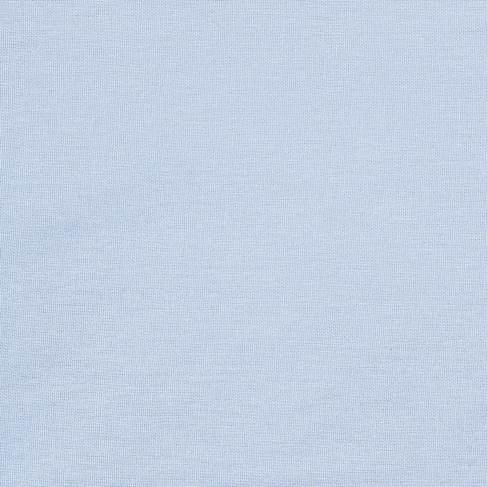 Soft light blue cloth napkins paired with a matching tablecloth and runner