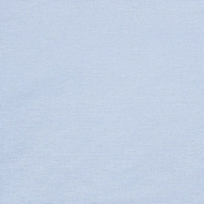 Soft light blue cloth napkins paired with a matching tablecloth and runner