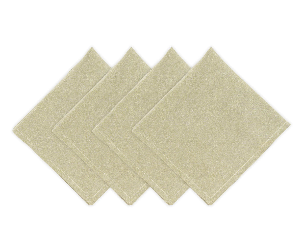 Light green cotton napkins on a dining table