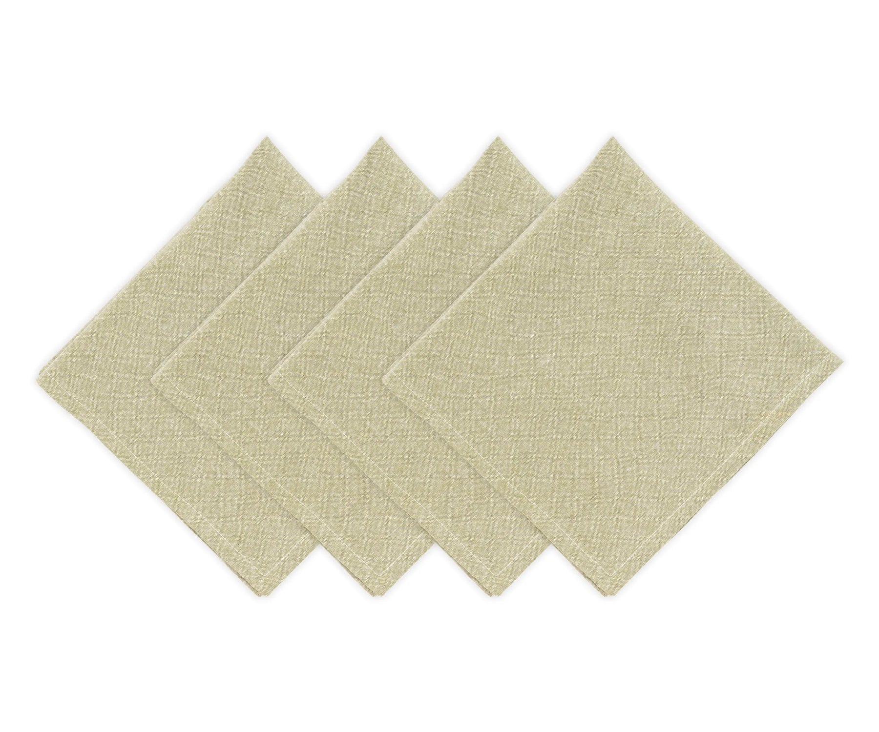Light green cotton napkins on a dining table
