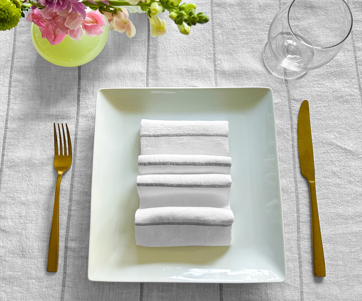 Discover the art of folding dinner napkins, explore various sizes including linen options, perfect for weddings, and learn how to creatively fold napkins for a stylish dinner presentation.
