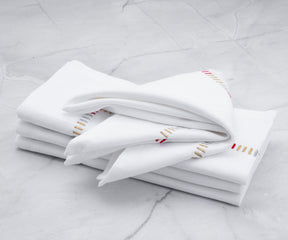 Opulent gold cloth napkins to add a touch of luxury