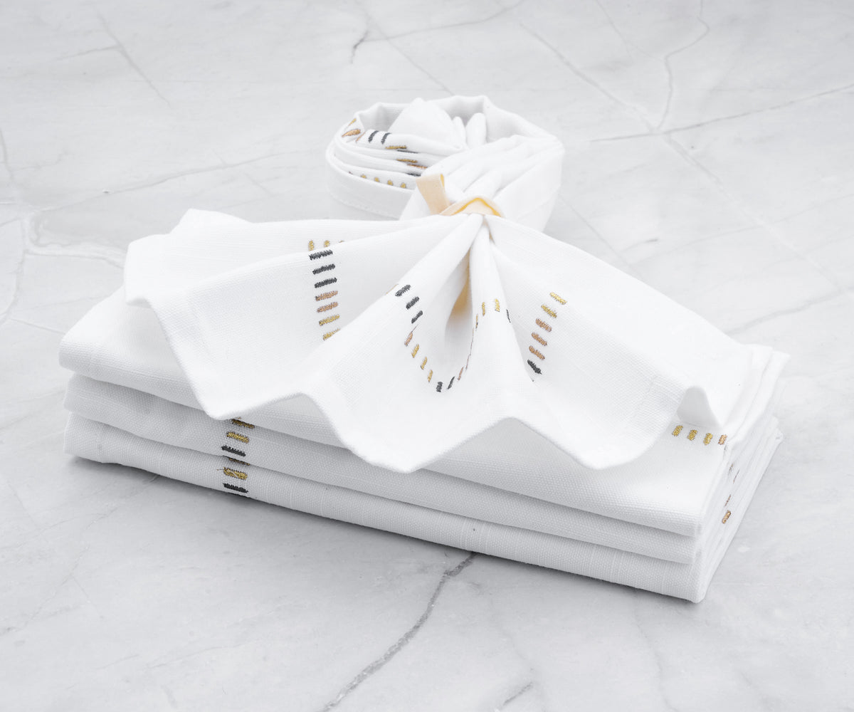 Opulent gold cloth napkins to add a touch of luxury