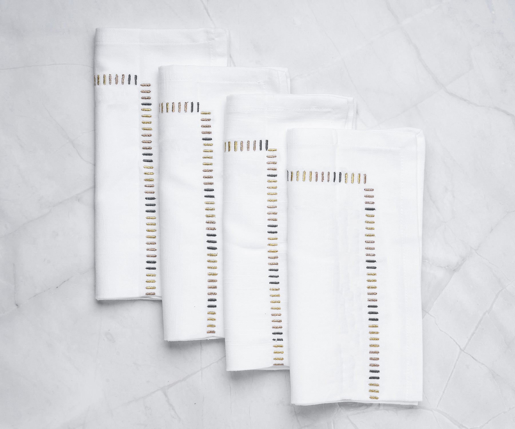 Crisp white cotton napkins for a clean and classic look