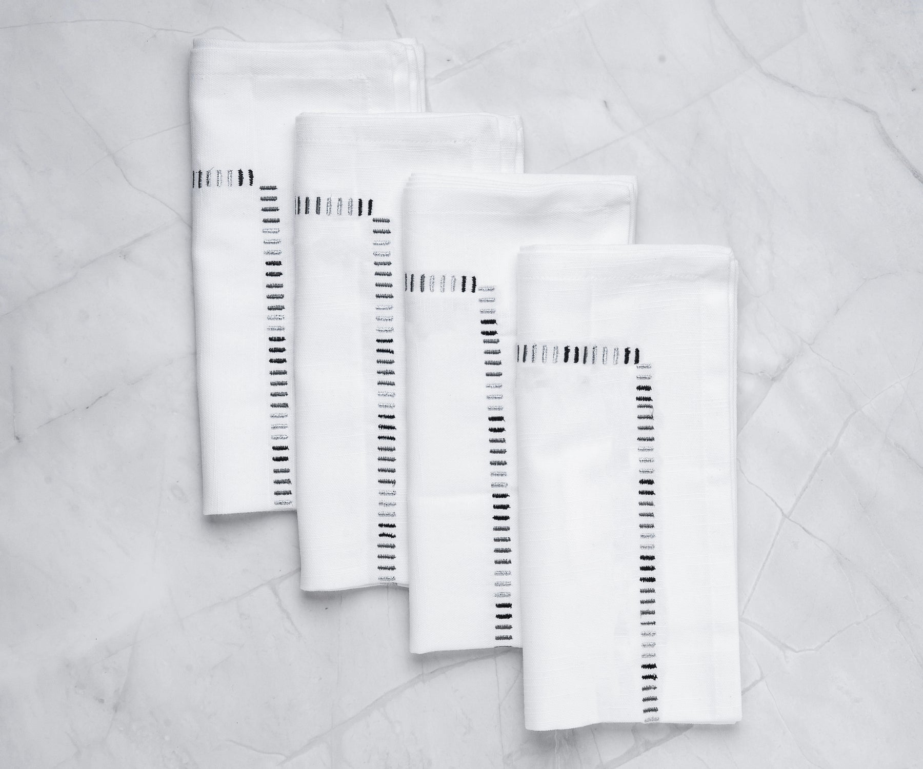 Pure white cotton napkins for a classic touch 