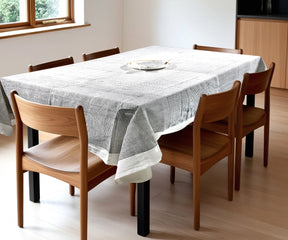 Black cotton tablecloth with line print design on a 6-seater dining table