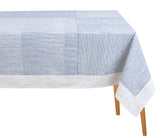 Blue cotton rectangular tablecloth with traditional block print on a dining table
