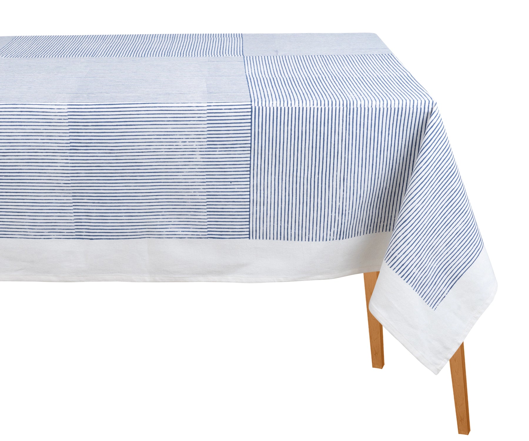 Blue cotton rectangular tablecloth with traditional block print on a dining table