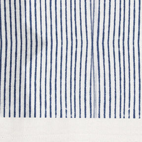 Elegant blue cotton tablecloth with floral centerpiece and wooden cutlery