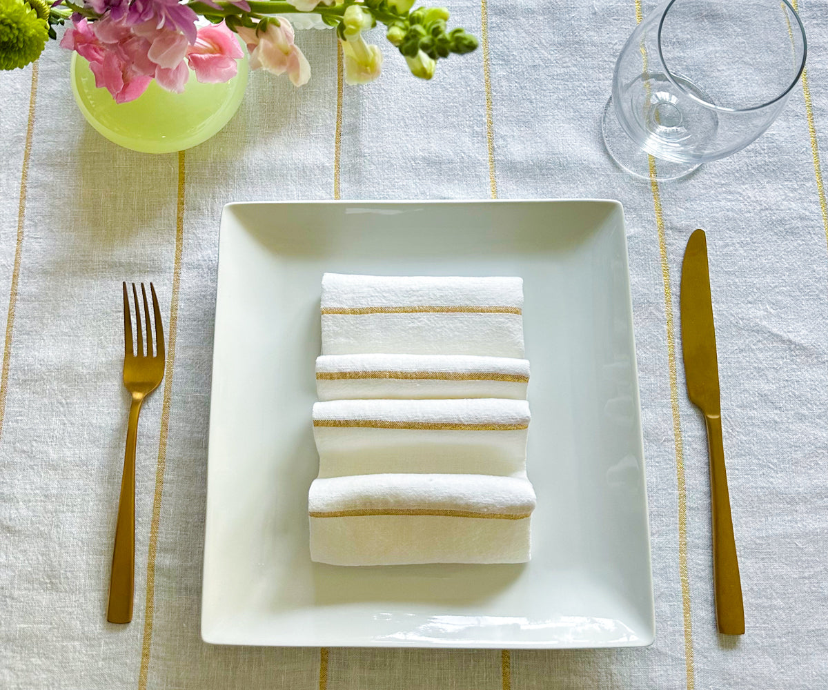 Discover the art of folding dinner napkins, explore various sizes including linen options, perfect for weddings and learn how to fold napkins for dinner.