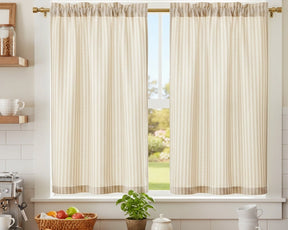 Short linen cafe curtains in a bright farmhouse kitchen breakfast nook
