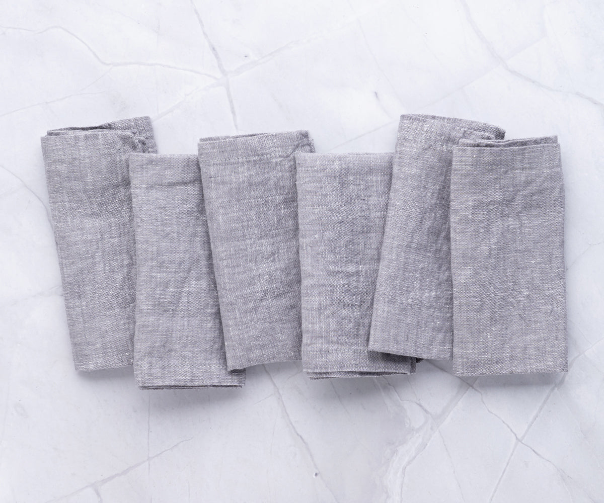Gray napkins, neutral and chic, providing an elegant backdrop for your table arrangement.