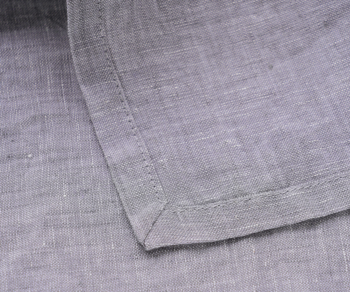 Linen dinner napkins, in a classic gray hue, elevating the elegance of your dinner table.