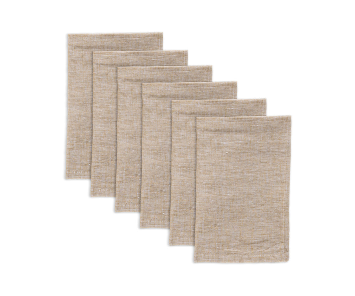 Beige linen napkins, with their subtle texture, bring an understated elegance to your table.