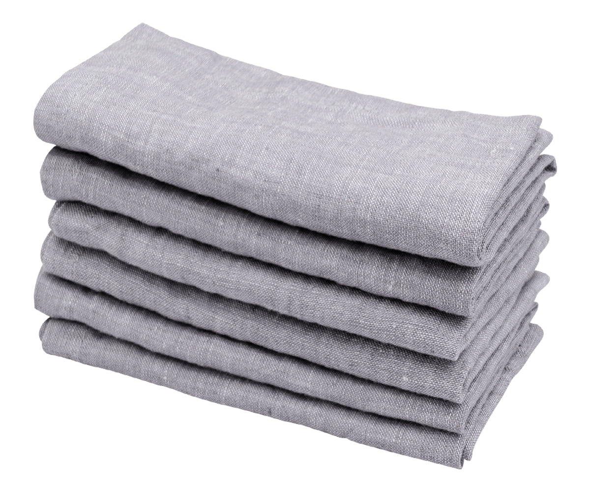 Expertly folded gray napkins, adding a touch of sophistication to your formal dining setting.