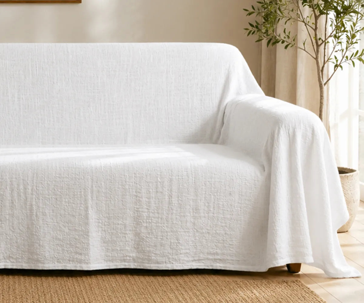 Washable linen sofa cover designed to protect couches from spills, dust, stains, and daily wear.
