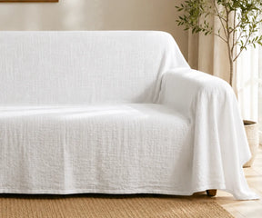 Washable linen sofa cover designed to protect couches from spills, dust, stains, and daily wear.