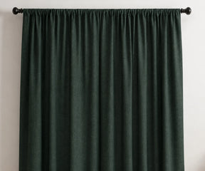Dark green linen curtain panels with a soft gathered drape, perfect for stylish window curtains.