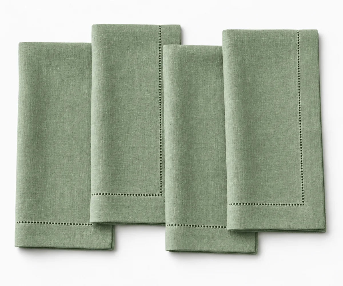Sage green linen table napkins with mitered corners, soft reusable napkins for weddings, events, and everyday meals