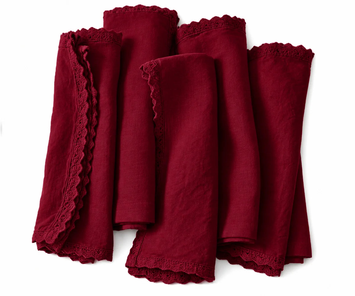 Burgundy linen cloth napkins featuring elegant lace edges for vintage-inspired dining decor