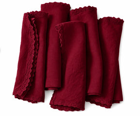 Burgundy linen cloth napkins featuring elegant lace edges for vintage-inspired dining decor