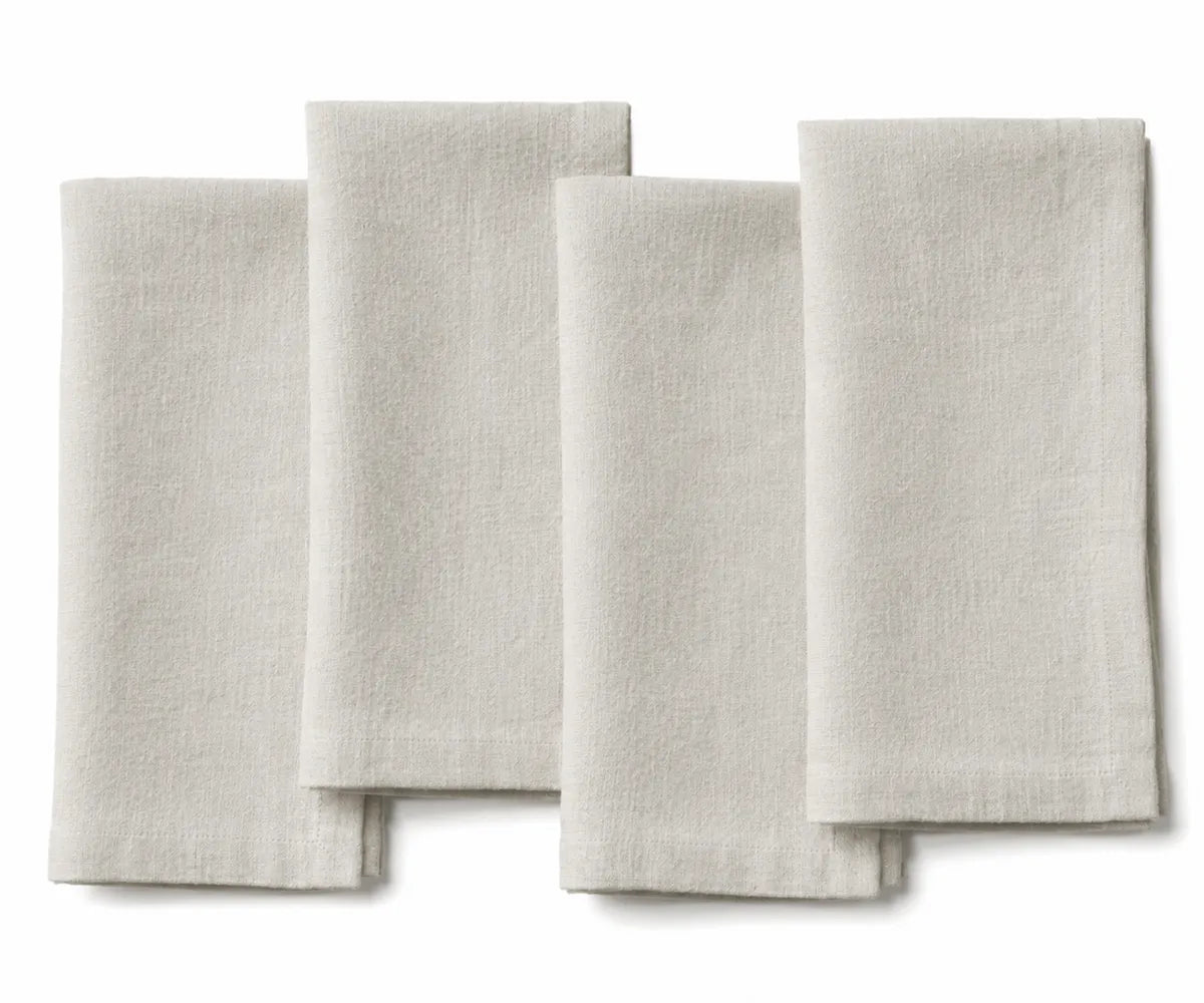 Natural flax plain linen napkin highlighting rustic beige tone and sustainable fabric texture