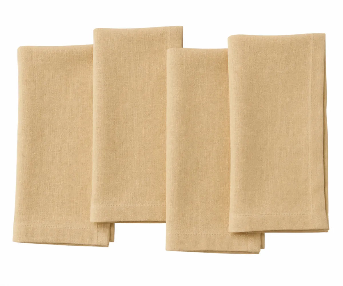 Bright yellow plain linen napkin displayed on a table, highlighting soft and durable fabric