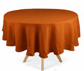 Shop rust round linen tablecloth made from 100% natural linen, perfect for elegant dining table decor and stylish home dining.