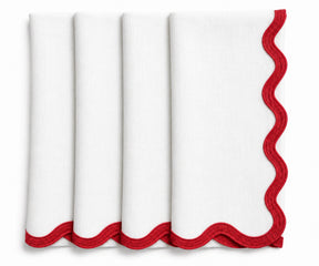 White linen scalloped edge napkins accented with red embroidery, timeless reusable dinner napkins for holiday meals and entertaining.