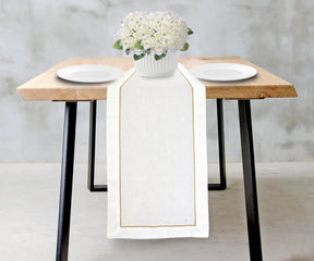 Classic cotton table runner perfect for special occasions.