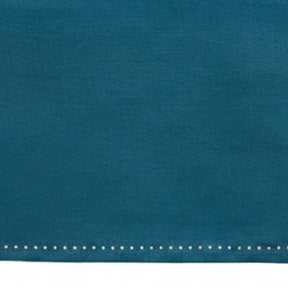 Breathable linen dining tablecloth paired with layered table décor for an elegant and sophisticated tablescape