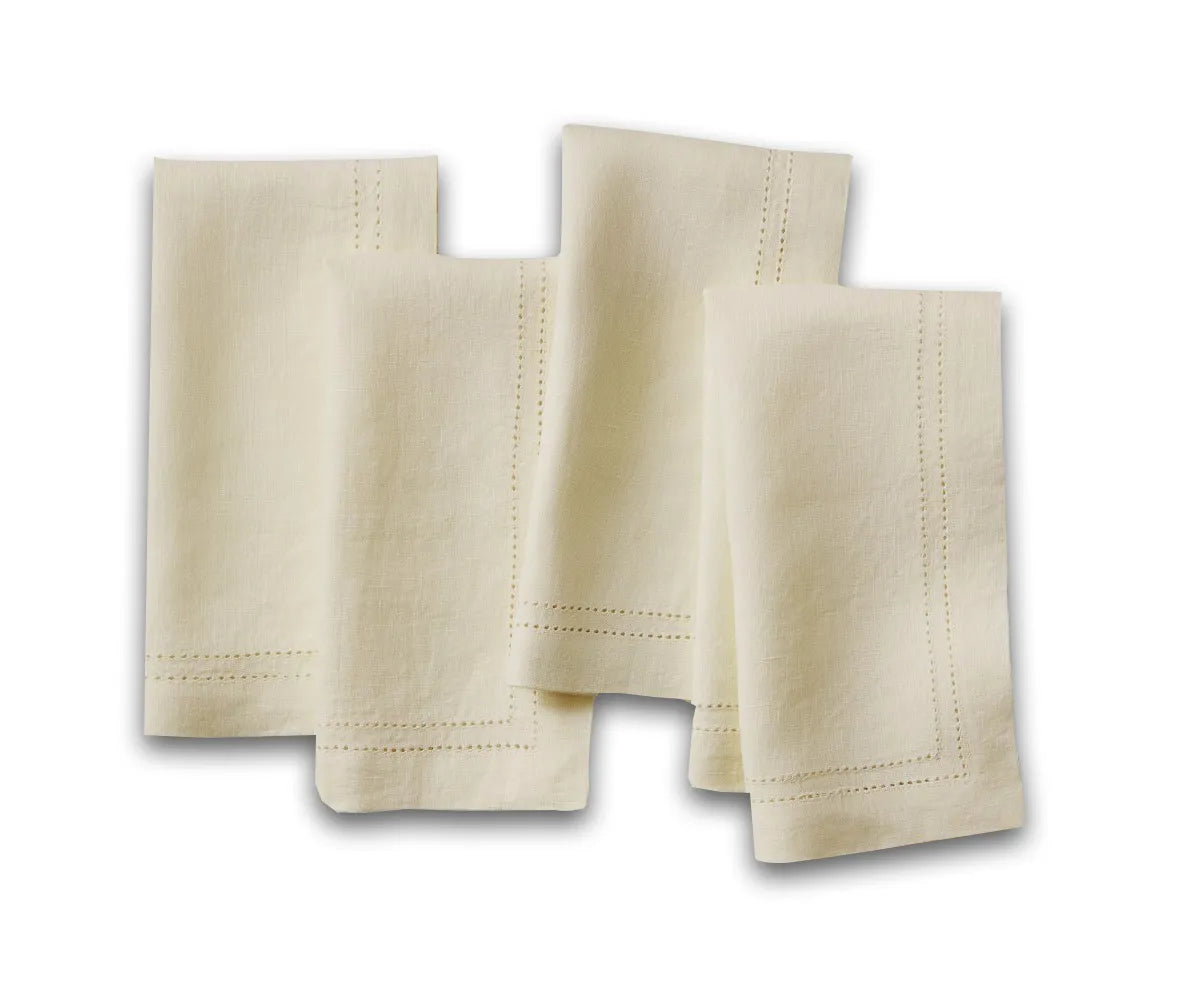 Sand Linen Hemstitch Napkins neatly folded on a dinner table setup – 100% linen napkins for weddings and events