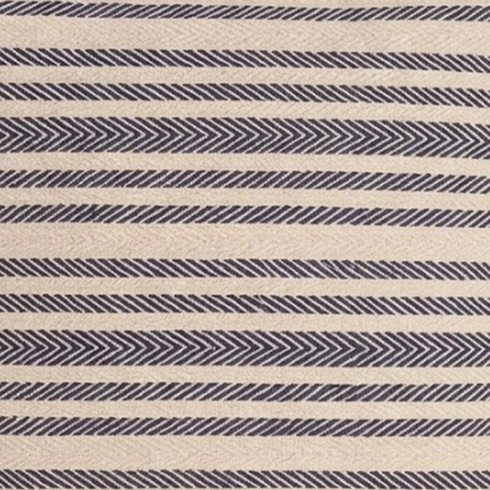 Close-up texture of a navy blue and beige jacquard striped fabric featuring a detailed herringbone and chevron weave pattern.