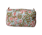 Floral quilted cotton cosmetic travel bag with pink and green botanical design