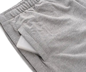 Gray mens shorts with an elastic waistband on a white background