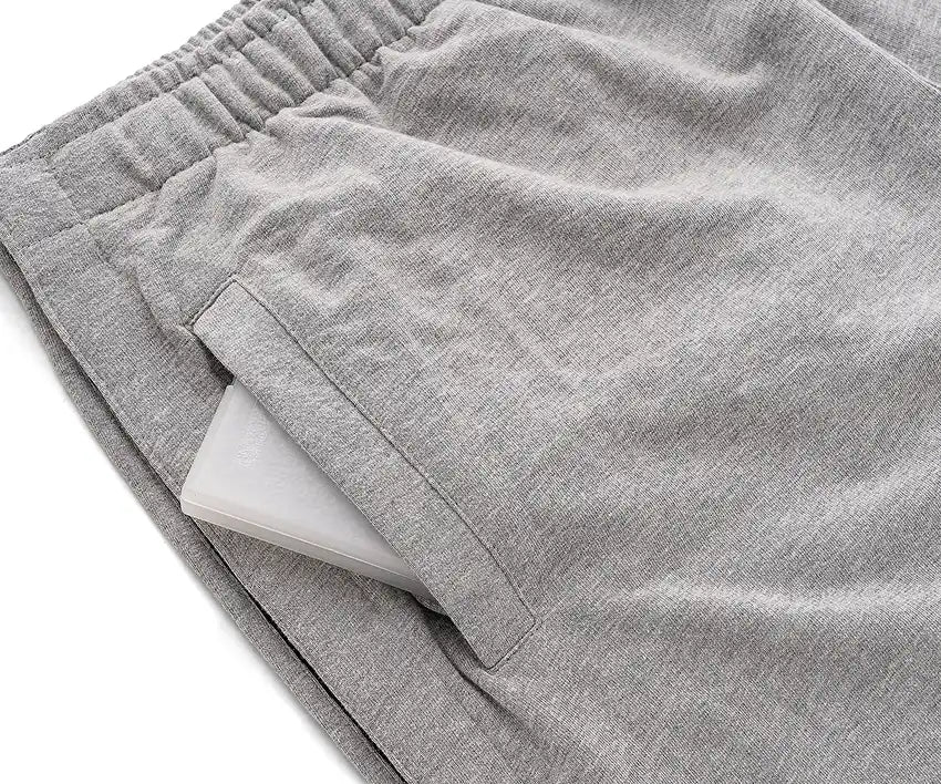 Gray mens shorts with an elastic waistband on a white background