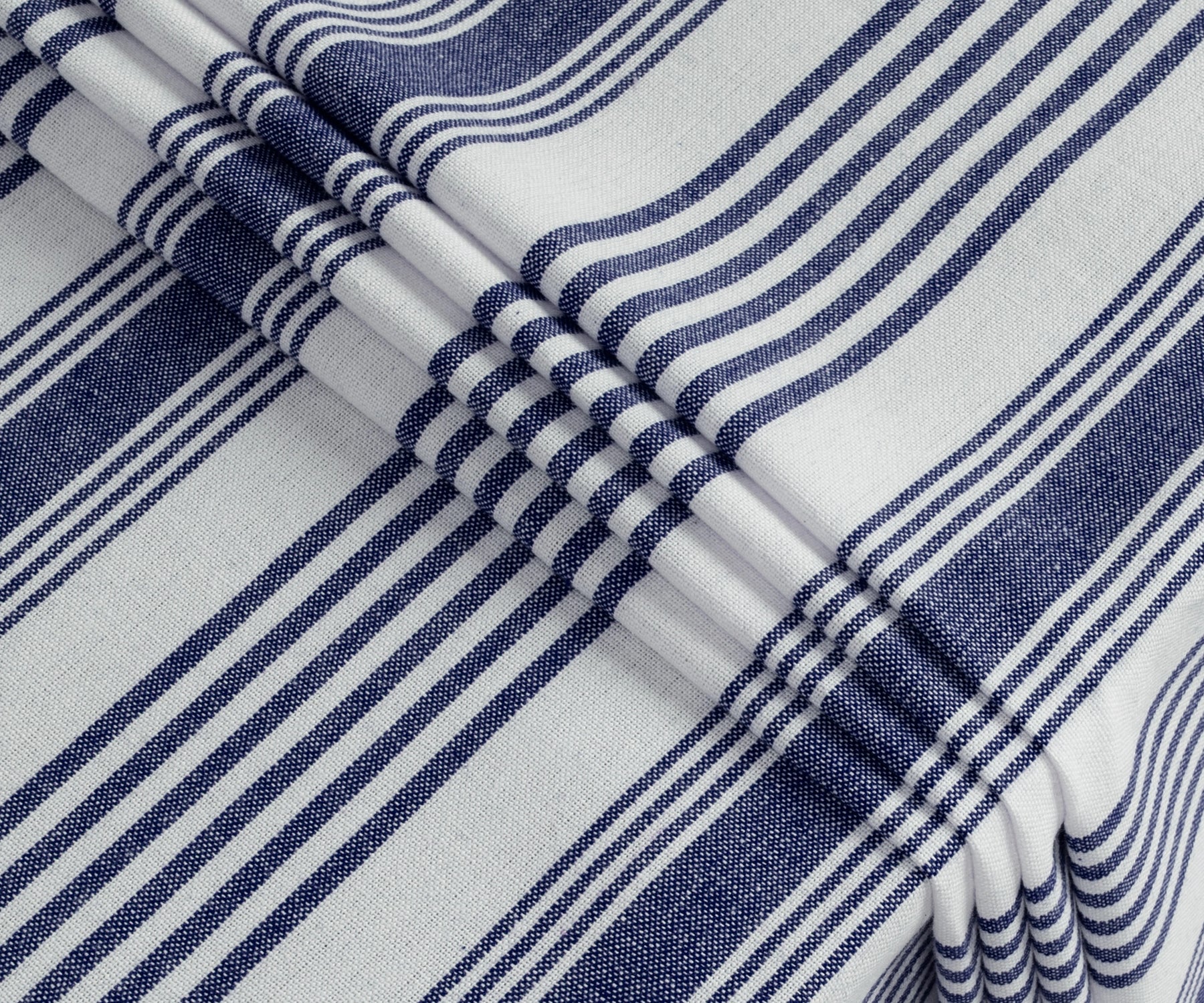 Rectangular blue and white striped cotton tablecloth covering dining table, multiple sizes