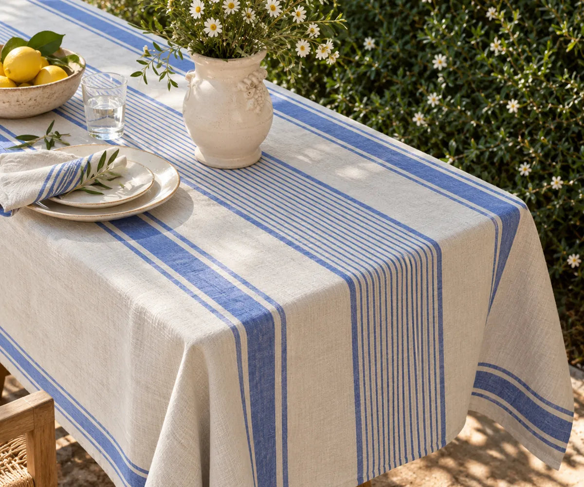 Rectangle linen table covering with traditional French-style stripes, suitable for farmhouse dining and everyday meals.