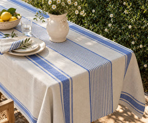 Rectangle linen table covering with traditional French-style stripes, suitable for farmhouse dining and everyday meals.