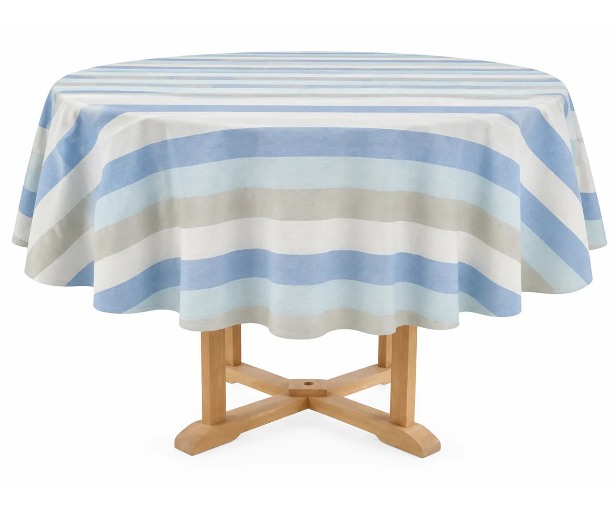 Cotton round tablecloth featuring horizontal multi-stripes in blue, light blue, and neutral beige, draped over a round wooden table against a plain white background.