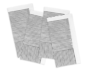 Cotton dinner napkins displayed on a modern table setup