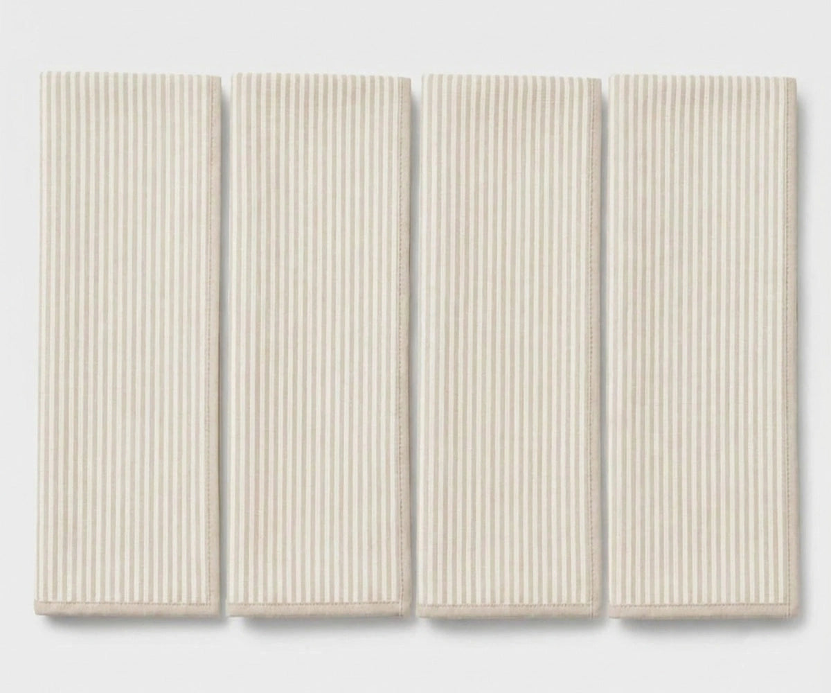 Natural striped linen napkins set of 4 crafted from 100% linen, reusable cloth dinner napkins for rustic farmhouse tables, family dinners, weddings, and entertaining guests.