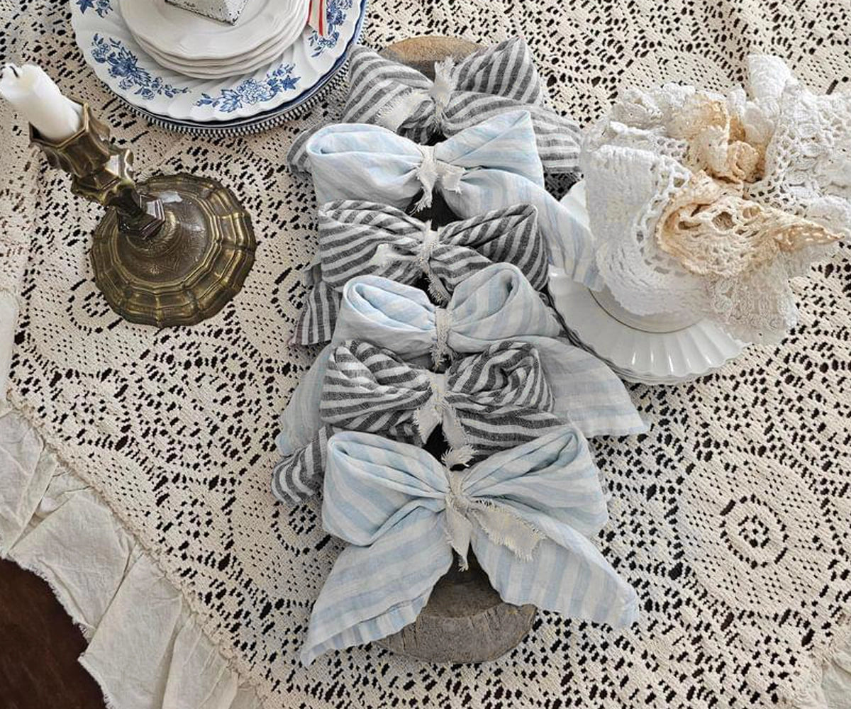 Breathable natural fiber napkins with timeless striped detailing for year-round table styling
