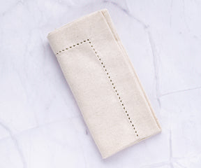 Enhance your table decor with a sophisticated Gold Napkin Holder.