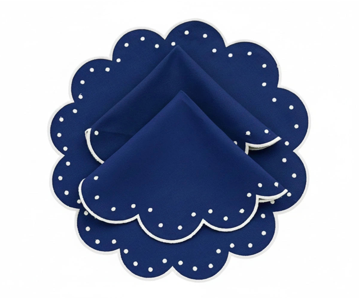 Navy blue round dining placemats made from 100% cotton with elegant scalloped border