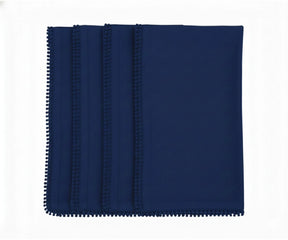 Navy blue cotton pom pom napkins with knotted edge for classic and formal table settings